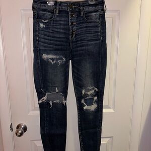 High rise stretchy skinny jeans, distressed. 8/29.